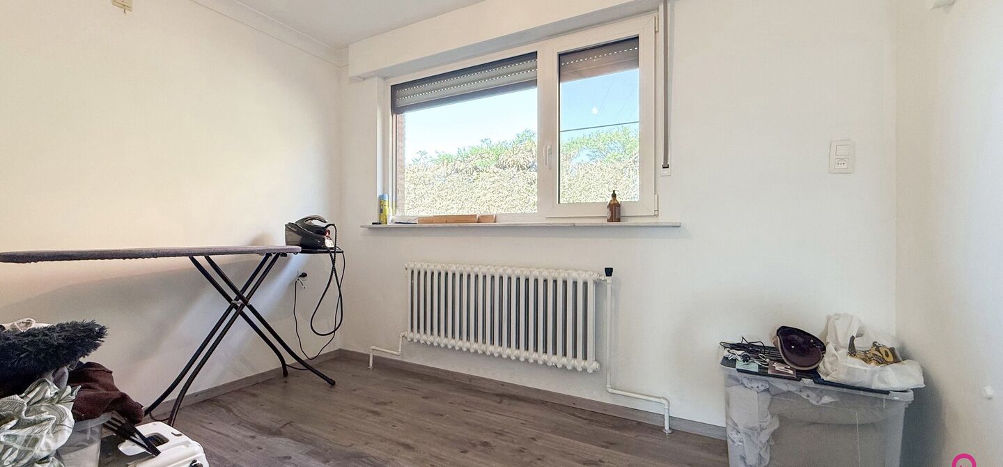 Bij ImmoFusion 7/7 “open huis” : klik op onze 3D-TOUR.
Ervaar vastgoed alsof je er zelf doorloopt!

Welkom op de Graaf de Theuxlaan 5 te Heusden-Zolder! Deze ruime split-level woning op een perceel van 8a36ca biedt niet alleen een verrassende indeling