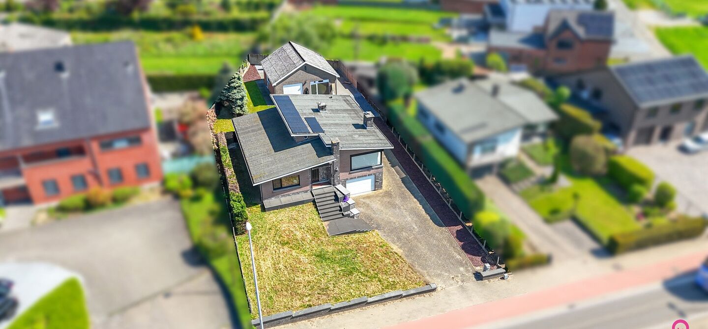 Bij ImmoFusion 7/7 “open huis” : klik op onze 3D-TOUR.
Ervaar vastgoed alsof je er zelf doorloopt!

Welkom op de Graaf de Theuxlaan 5 te Heusden-Zolder! Deze ruime split-level woning op een perceel van 8a36ca biedt niet alleen een verrassende indeling